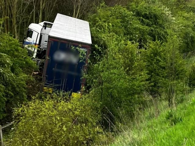 A lorry crashed down a bank on the A1(M) this morning