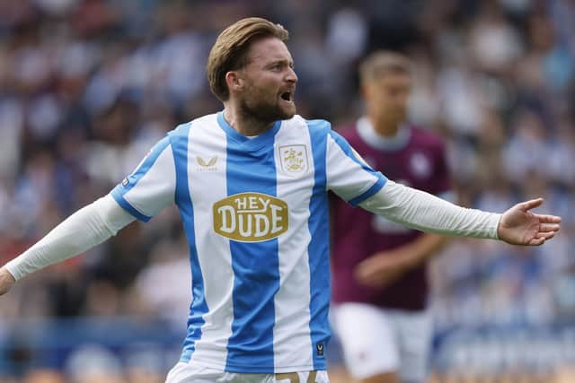 MARCHING ORDERS: Huddersfield Town's Alfie May saw red in the first half at Wycombe. Picture: Richard Sellers/PA