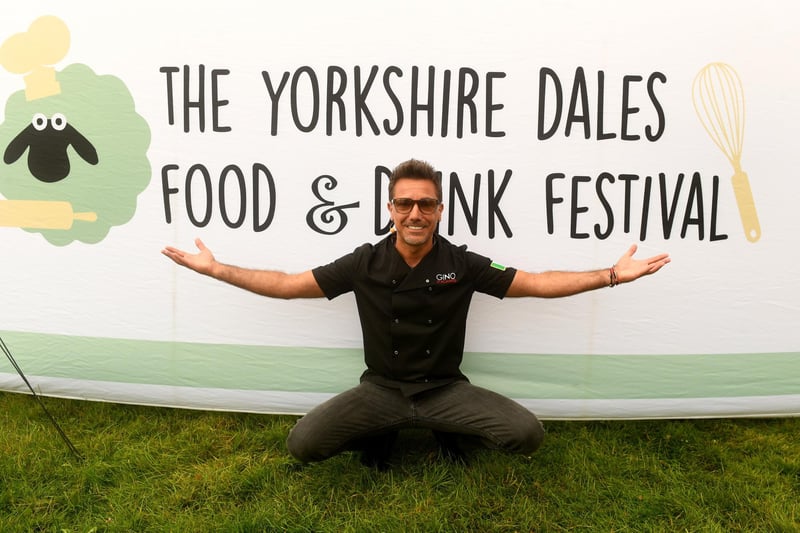 Gino D'Acampo pictured in front of the tent at the festival.
