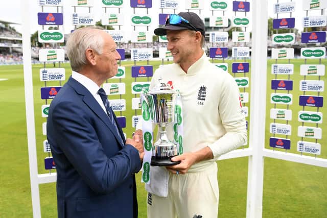 Colin Graves, then the England and Wales Cricket Board chairman, pictured presenting former Test captain Joe Root with his trophy after England's win against Ireland at Lord's in 2019. Photo by Gareth Copley/Getty Images.