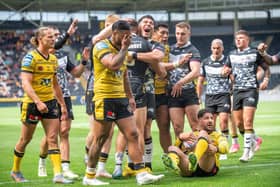 Hull celebrate Carlos Tuimavave's try against Castleford. (Photo: Picture by Bruce Rollinson)