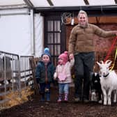 Ziggy Spilman and children Billy and Lara with the new goats on the farm