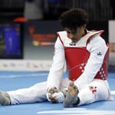 Mixed emotions: Huddersfield's Caden Cunningham reacts after suffering a shock defeat in Manchester, not knowing he had still qualified for the Olympics (Picture: Nigel French/PA)