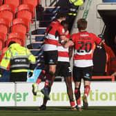 Doncaster Rovers' loanee Mo Faal celebrates scoring his side's fourth goal in the 4-1 win over Sutton United on Saturday. Picture: Jonathan Gawthorpe.