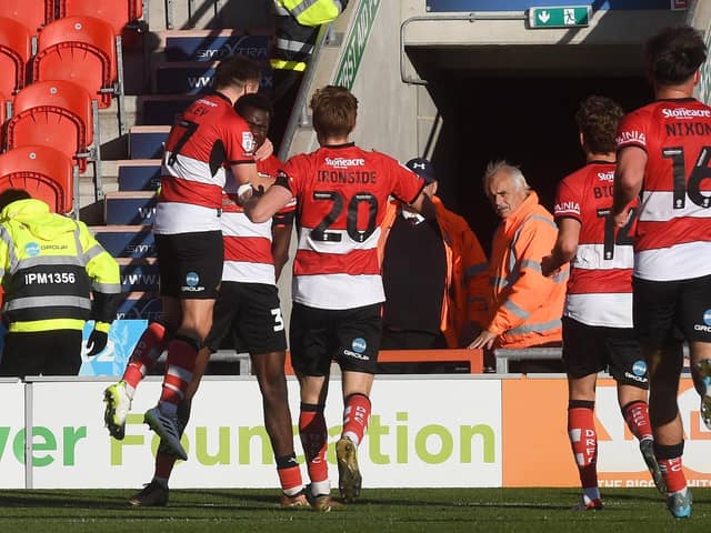 Doncaster Rovers' loanee Mo Faal celebrates scoring his side's fourth goal in the 4-1 win over Sutton United on Saturday. Picture: Jonathan Gawthorpe.