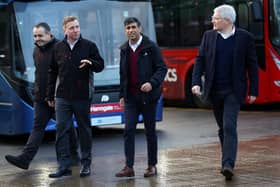 Prime Minister Rishi Sunak (second right) during a visit to a bus depot in Harrogate, North Yorkshire. PIC: Carl Recine/PA Wire