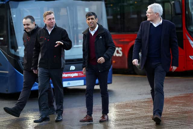Prime Minister Rishi Sunak (second right) during a visit to a bus depot in Harrogate, North Yorkshire. PIC: Carl Recine/PA Wire