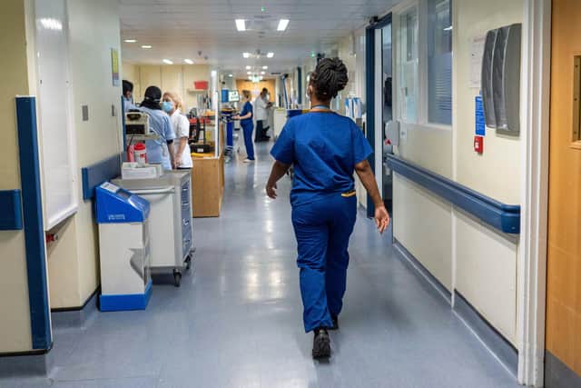 A general view of staff on a NHS hospital ward in London. PIC: Jeff Moore/PA Wire