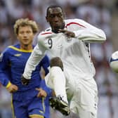 Spanning generations: Emile Heskey towards the latter stages of his long England career in 2008, when he still had a second World Cup ahead of him two years later (Picture: AN KINGTON/AFP via Getty Images)