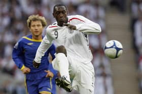 Spanning generations: Emile Heskey towards the latter stages of his long England career in 2008, when he still had a second World Cup ahead of him two years later (Picture: AN KINGTON/AFP via Getty Images)