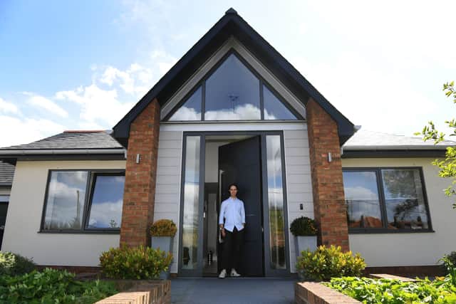 Architect Will Slack at the door of the property he designed for his parents
