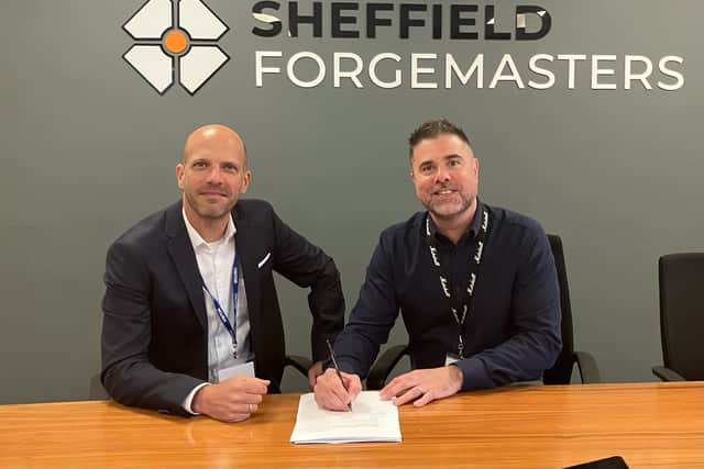(left/right) Roman Mueller-Huenervogt from Andritz Metals and Steve Marshall, Manufacturing Transformation Director at Sheffield Forgemasters, sign the furnaces contract for the UK’s largest open die forging line.