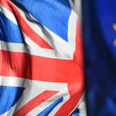 Union and European Union flags. PIC: PA