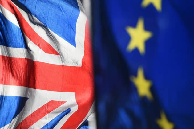 Union and European Union flags. PIC: PA