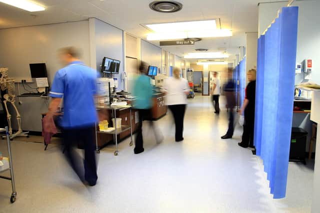 A general view of staff on a NHS hospital ward. PIC: Peter Byrne/PA Wire