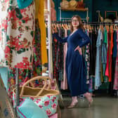 Kristen Clark, Assistant Manager at Saint Michael's Hospice Charity Shop in Harrogate, wears a designer dress from the King's Road shop's boutique collection..