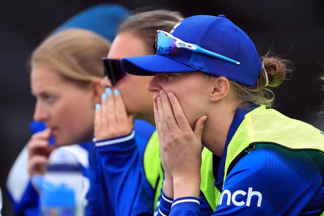Nailbiting: England's Lauren Filer and team-mates react as they watch the action as they bat during the final over of the second ODI (Picture: Bradley Collyer/PA Wire)