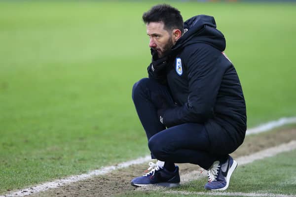 Carlos Corberan, manager of Huddersfield Town, reacts during the Sky Bet Championship match between Huddersfield Town and Wycombe Wanderers at John Smith's Stadium on February 13, 2021.