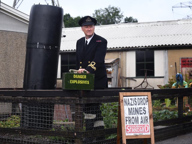 Pictured Tony Boyle with a German parachute mine