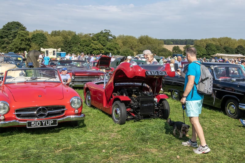 Visitors take a close look at the vehicles on show.