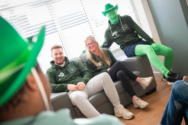 Harry Spillings, Riannon Speechley and ‘Mr Green’ – Will Mellor in the Green Room Project House. Photo: University of Hull