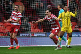 ON TARGET: Doncaster Rovers' Owen Bailey celebrates scoring the second goal against Sheffield Wednesday. Picture: Jonathan Gawthorpe.
