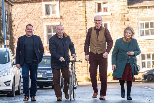Long Course Weekend’s founder and chief executive, Matthew Evans, North Yorkshire Council’s executive member for open to business, Cllr Derek Bastiman, Masham, Parish Council vice-chair, Ian Johnson, and Flo Grainger, owner of the Old Station Caravan Park, pictured in Masham. Image NYC