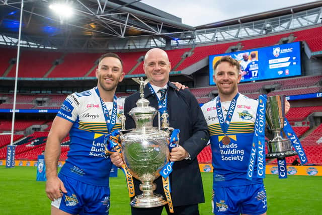 Luke Gale with Richard Agar and the Lance Todd Trophy-winning man of the match Richie Myler after Leeds' Challenge Cup final win over Salford in 2020. (Photo: Allan McKenzie/SWpix.com)