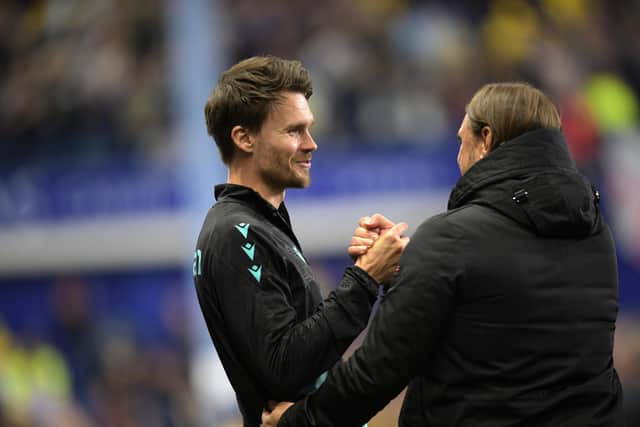 Sheffield Wednesday boss Danny Rohl with Leeds United counterpart Daniel  Farke at the final whistle. Picture: Steve Ellis.