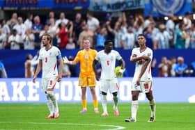 THE GREAT LEVELLER: England's Jude Bellingham (right) reacts after Argentina's Enzo Fernandez (not pictured) scored his side's equalising goal at the Atlanta Stadium. Picture: Bradley Collyer/PA