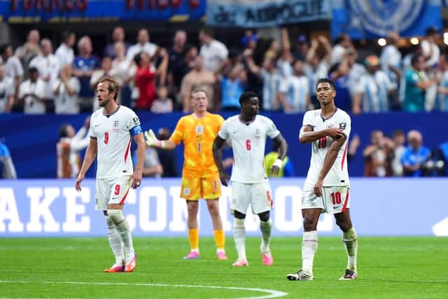 THE GREAT LEVELLER: England's Jude Bellingham (right) reacts after Argentina's Enzo Fernandez (not pictured) scored his side's equalising goal at the Atlanta Stadium. Picture: Bradley Collyer/PA