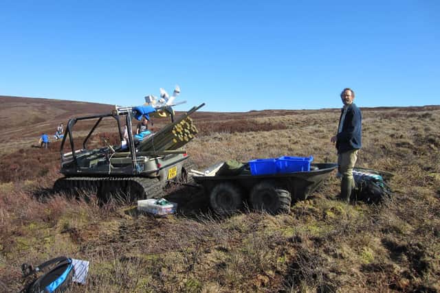 Dr Andreas Heinemeyer of the University of York setting up experimental equipment on the moors in the early years of the project.