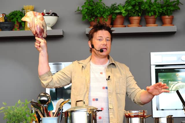 Jamie Oliver demonstrates his cooking at the Taste of London event in Regents Park, London.