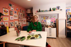 Nikki, aka The Print Lass, in her basement studio