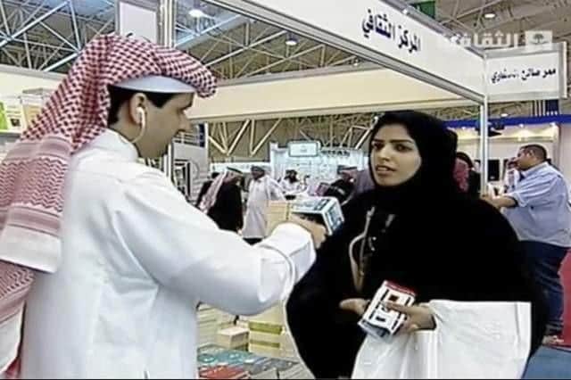 Salma al-Shehab speaks to a journalist at the Riyadh International Book Fair back in March 2014.