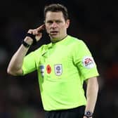 VAR VILLAIN: Darren England was in Stockley Park for the controversial Tottenham Hotspur v Liverpool game the day after flying back from refereeing in the United Arab Emirates