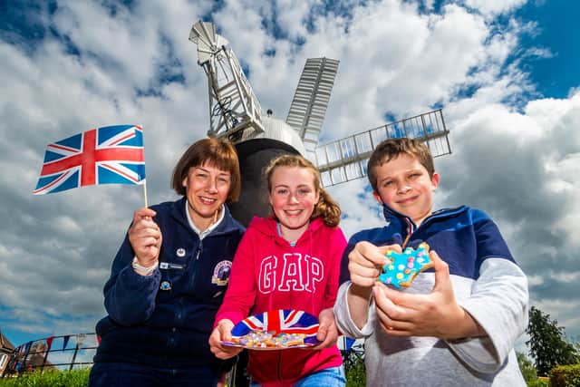 Helen Hoult, Vice-Chairman of the Holgate Windmill preservation society, with two children who took part in the event Catherine, 12, and brother Matthew, 10, Bartlett, from Malton. Picture By Yorkshire Post Photographer,  James Hardisty. Date: 7th May 2023.