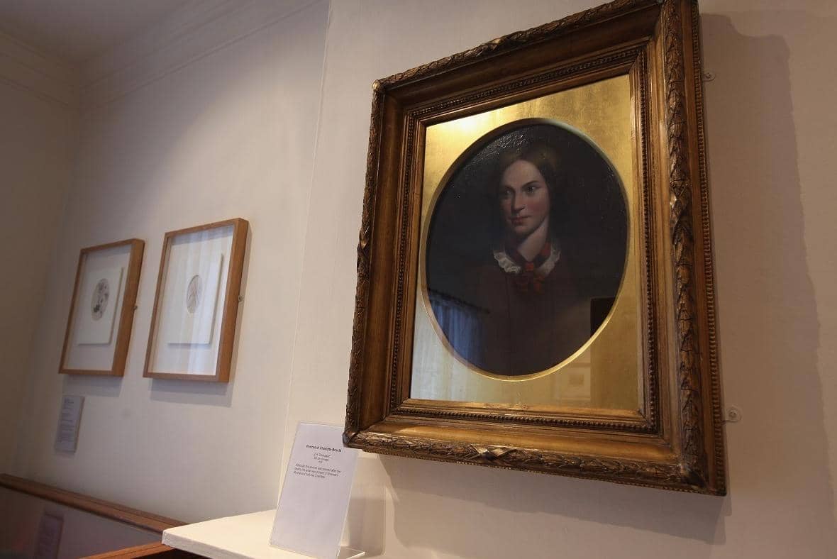 A portrait of Charlotte Bronte on display in her old bedroom at the Bronte Parsonage Museum. (Pic credit: Christopher Furlong / Getty Images)