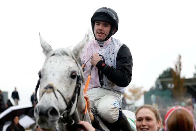 Winning ride: Darragh O'Keeffe celebrates winning The bet365 Charlie Hall Chase on Gentlemansgame - on the jockey's first visit to the track.
Picture: Nigel French/PA Wire.