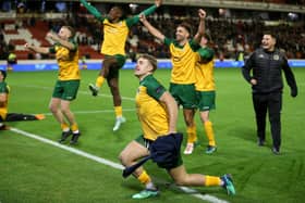 Horsham players celebrate following the Emirates FA Cup first round match at Oakwell Stadium, Barnsley. (Picture: PA)