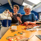 Staff and volunters preparing costumes at the York Theatre Royal Wardrobe Department in York  for the new tudor production Sovereign. Pictured Chloe Moore, Senior Wardrobe Technician working alongside Janet Hull, Deputy Head of Wardrobe/Cutter.