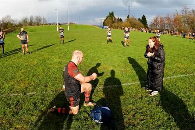 Chris Robinson, 30, choreographed a rugby tackle with his whole team in on the elaborate plan to catch his partner, Amanda Tuckwell, 43, unawares.