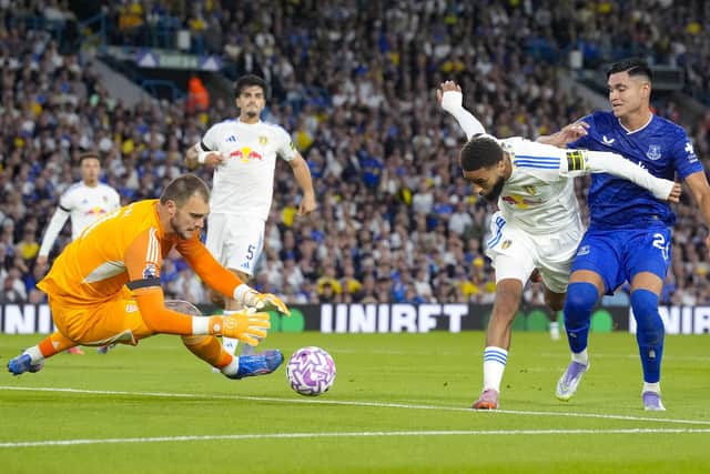 HEAVY TOUCH: Carlos Alcaraz (right) is unable to make anything of a rare Everton attack (Image: Danny Lawson/PA Wire)