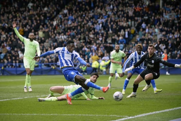 Anthony Musaba steers the ball home for the Sheffield Wednesday opener (Picture: Steve Ellis)