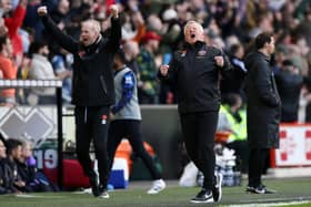 PRIDE: Sheffield United manager Chris Wilder (right) after Bogle's goal