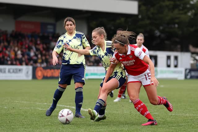 Macy Ellis of Leeds United is challenged by Katie McCabe of Arsenal during the Vitality Women's FA Cup Fourth Round match between Arsenal and Leeds United at Meadow Park. (Picture: Catherine Ivill/Getty Images)