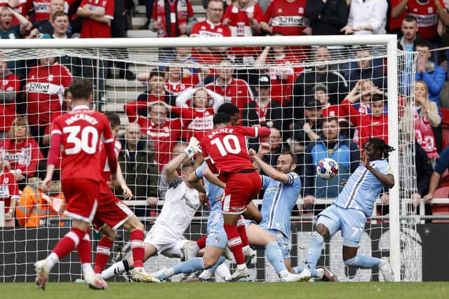 Middlesbrough's Cameron Archer (centre) scores their side's first goal of the game during the Sky Bet Championship match at the Riverside Stadium, Middlesbrough. Picture date: Monday May 8, 2023. PA Photo. See PA story SOCCER Middlesbrough. Photo credit should read: Richard Sellers/PA Wire.

RESTRICTIONS: EDITORIAL USE ONLY No use with unauthorised audio, video, data, fixture lists, club/league logos or "live" services. Online in-match use limited to 120 images, no video emulation. No use in betting, games or single club/league/player publications.