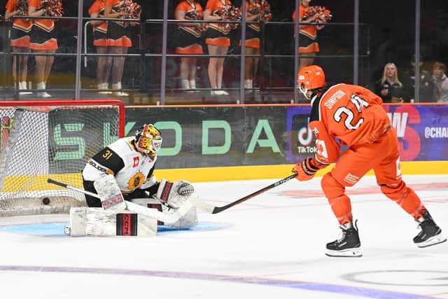 MAGIC MOMENT: Mark Simpson beats Alexander Hellnemo to make it 3-2 to Sheffield Steelers against Skellefteå AIK in the Champions Hockey League at the Utilita Arena - it proved to be the winning goal. Picture: Dean Woolley/Hayley Roberts/Steelers Media.