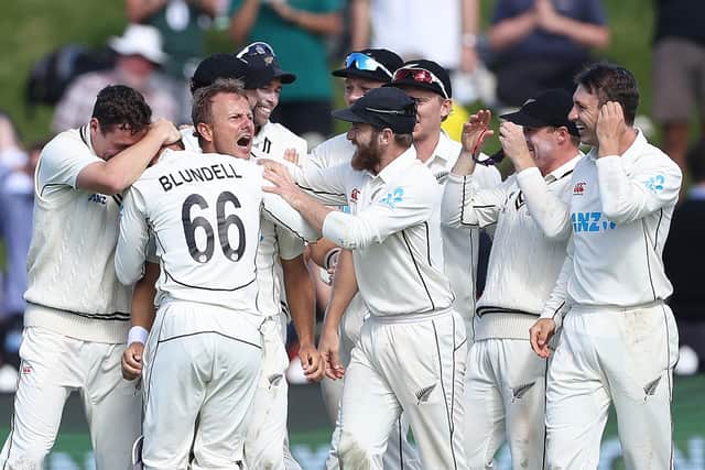Neil Wagner, the new Yorkshire signing, is mobbed by his New Zealand team-mates after dismissing James Anderson to complete a thrilling win that showcased the very best of Test cricket. Photo by Phil Walter/Getty Images.
