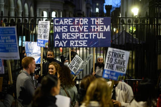 NHS workers and supporters gather outside Downing Street to protest in December. PIC: Leon Neal/Getty Images